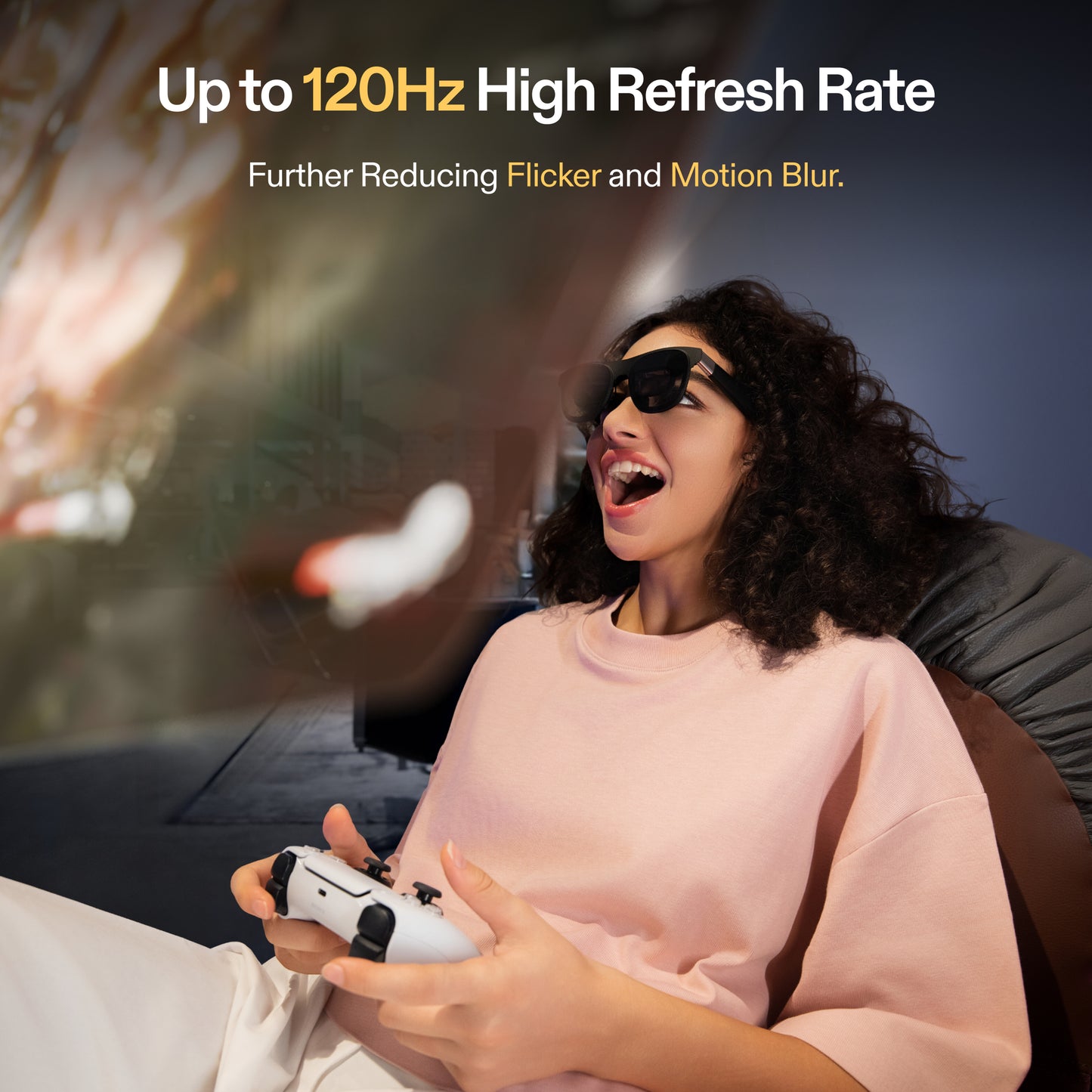 Woman wearing XREAL One AR glasses playing video games, illustrating up to 120Hz refresh rate that reduces flicker and motion blur
